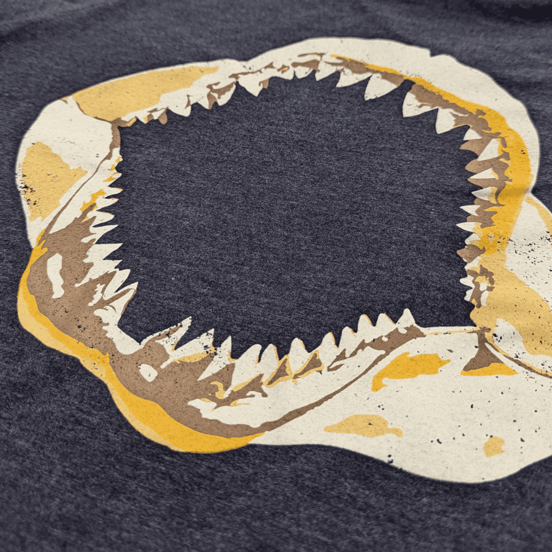 Shark teeth design on dark fabric.