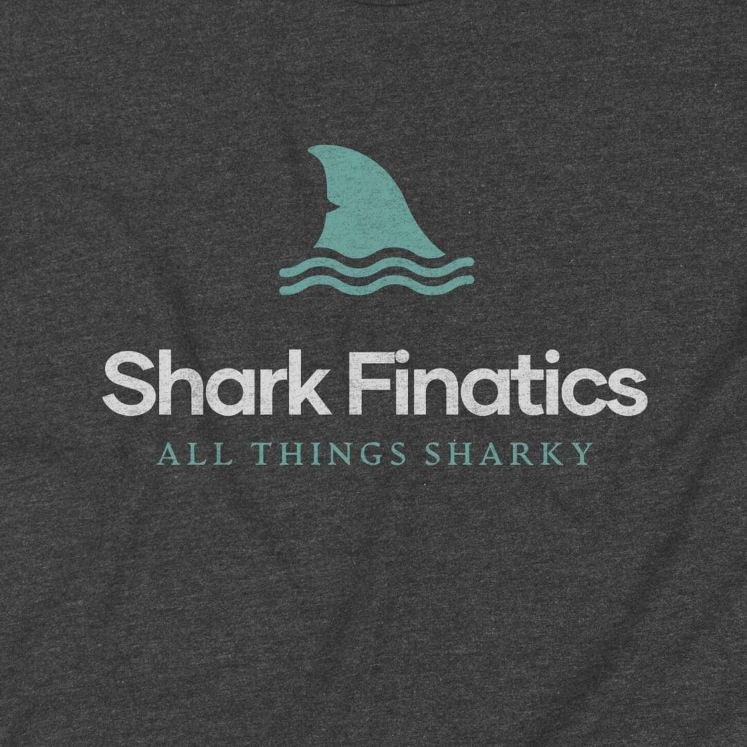 Shark Finatics logo print on black fabric